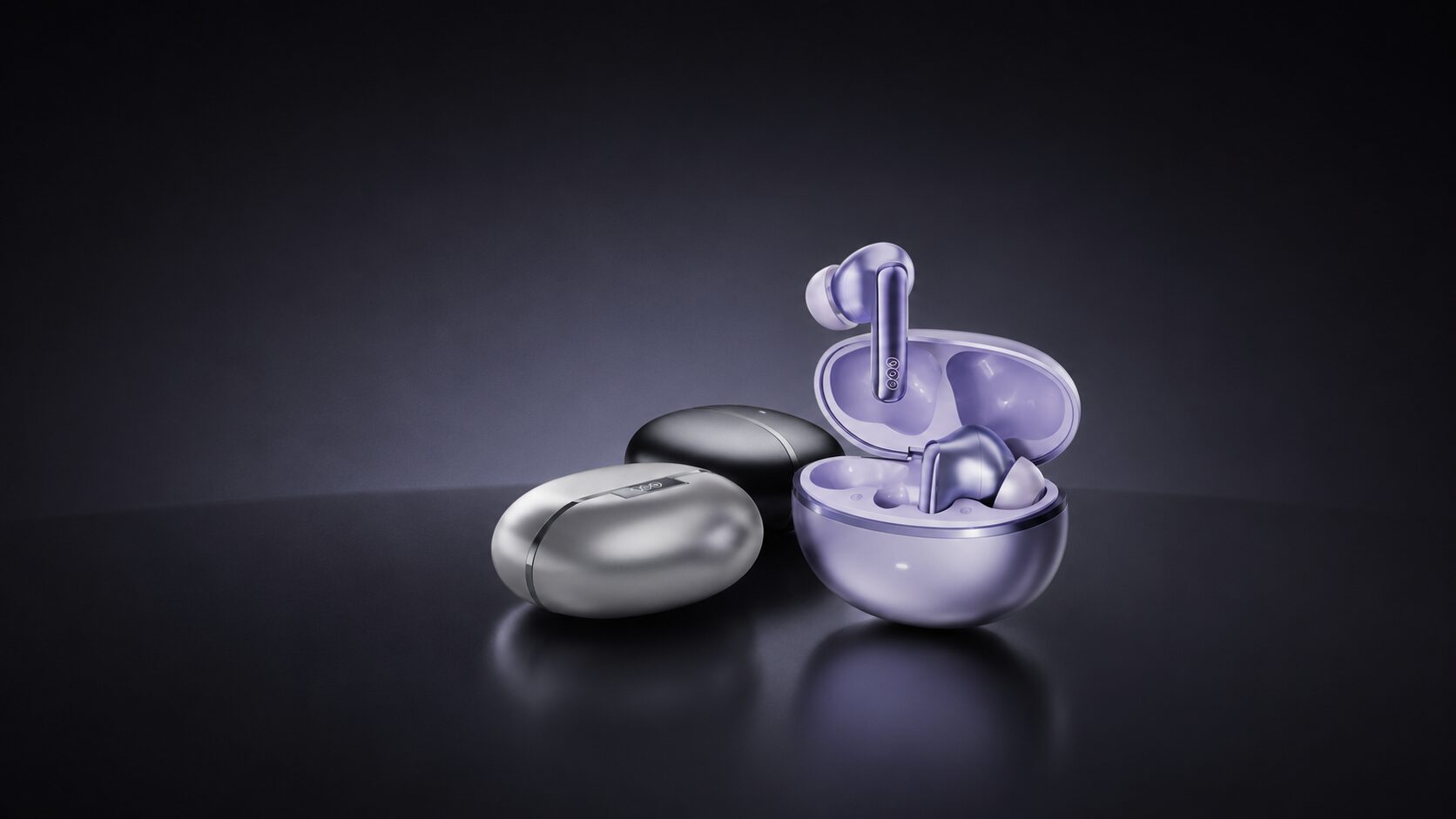 QCY MeloBuds N70 wireless earbuds and charging cases on a dark studio background