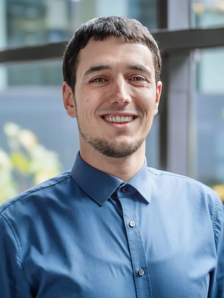 Portrait of Michele Lucchi wearing a blue shirt